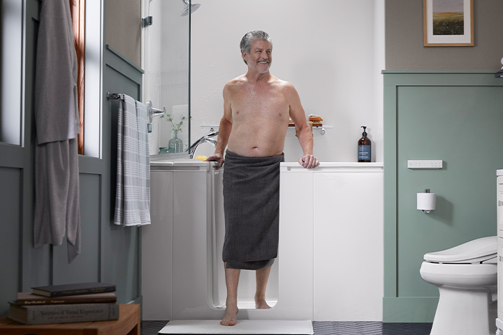 Man stepping out of the Walk-In Bath