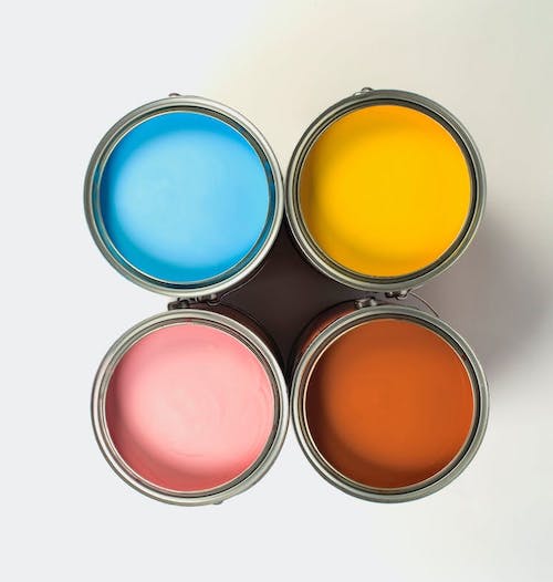 Paint cans on floor with no lid