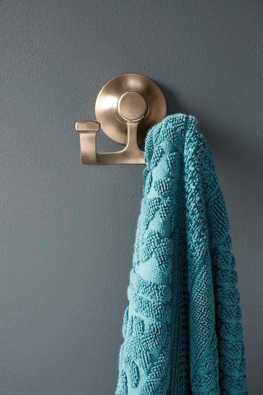 Turquoise towel on towel rack