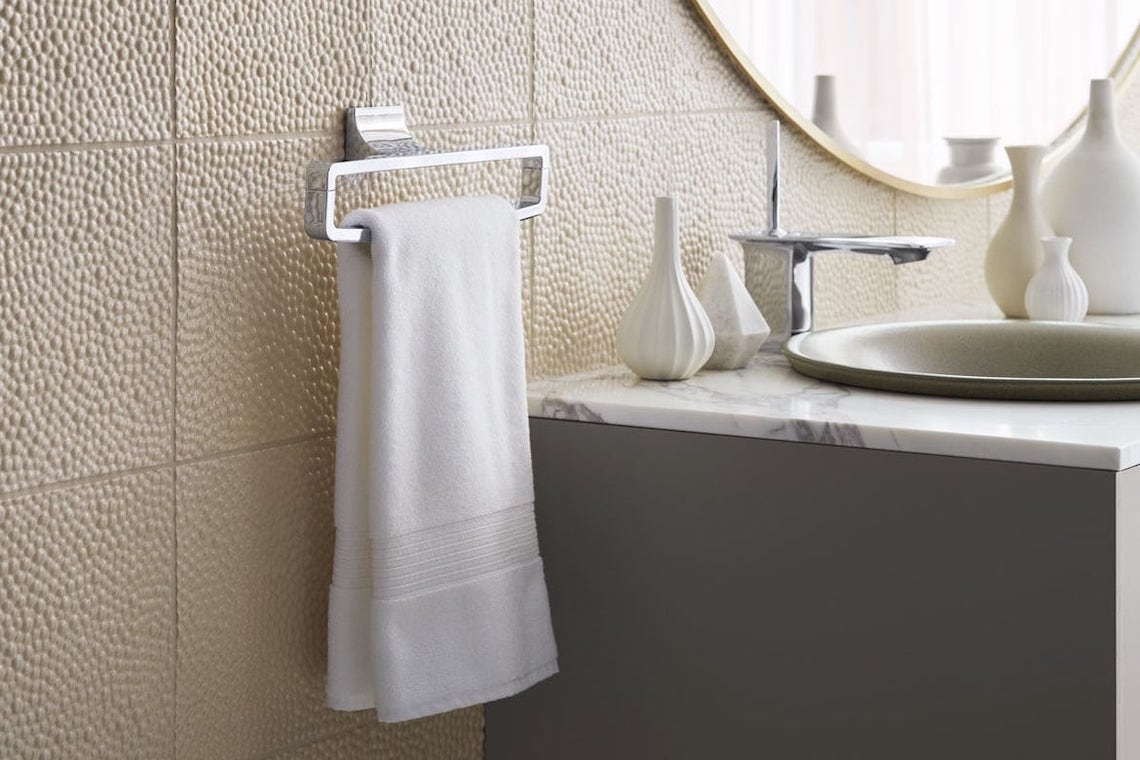 storing towels under bathroom sink