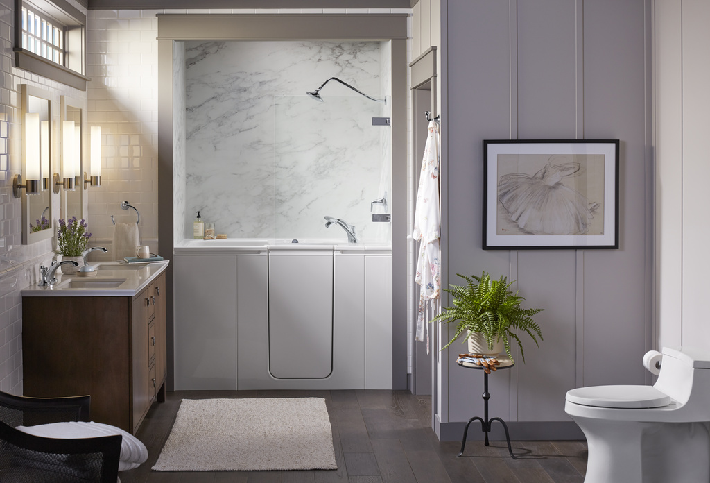 Purple bathroom with a walk-in bath shower combo.