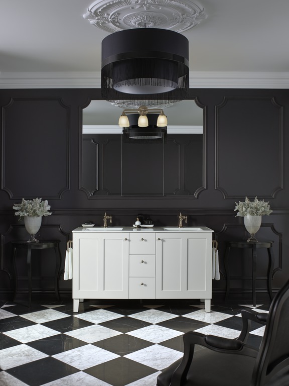 Black and white Art Deco style bathroom with white dual vanity and tiled floroing