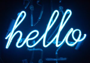 LED sign with the words "hello" illuminated