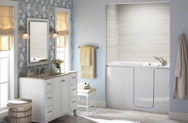 blue walls with white bathroom fixtures and yellow curtains and towels