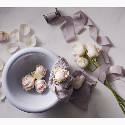 light purple bowl sink with roses in it for your luxury shower experience. 