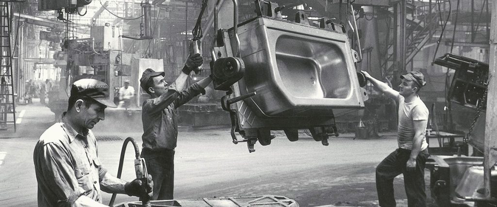 Black and white image of the modern bathtub being manufactured