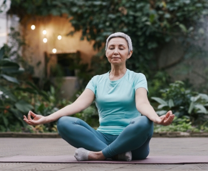 woman meditating in a yoga pose