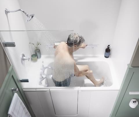 man standing in bath tub combo